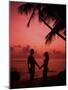 Couple Enjoying a Romantic Sunset on the Beach-Bill Bachmann-Mounted Photographic Print