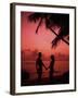 Couple Enjoying a Romantic Sunset on the Beach-Bill Bachmann-Framed Photographic Print