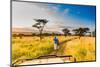 Couple enjoying view at a safari camp, Zululand, South Africa-Laura Grier-Mounted Photographic Print