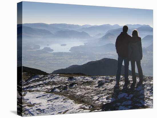 Couple Gazing at Mountain Landscape-Anthony West-Stretched Canvas