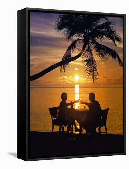 Couple Having Dinner at the Beach, Toasting Glasses, Maldives, Indian Ocean, Asia-Sakis Papadopoulos-Framed Stretched Canvas