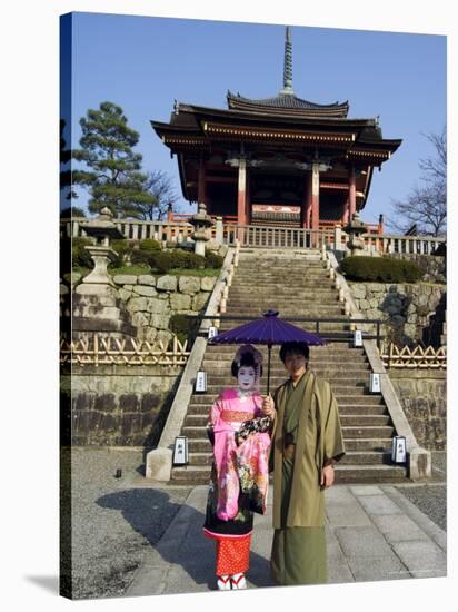 Couple Holding Parasol, Kiyomizu Dera Temple, Kyoto, Japan-Christian Kober-Stretched Canvas