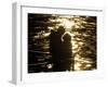 Couple Hug Each Other in the Winter Sunshine by the River Danube in Budapest, Hungary-null-Framed Photographic Print