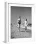 Couple in Bathing Suits at the Beach-Philip Gendreau-Framed Photographic Print