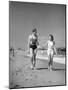 Couple in Bathing Suits at the Beach-Philip Gendreau-Mounted Photographic Print