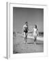 Couple in Bathing Suits at the Beach-Philip Gendreau-Framed Photographic Print