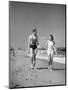 Couple in Bathing Suits at the Beach-Philip Gendreau-Mounted Photographic Print