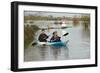 Couple in Kayak During January 2014 Flooding-David Woodfall-Framed Photographic Print