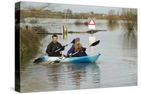 Couple in Kayak During January 2014 Flooding-David Woodfall-Stretched Canvas