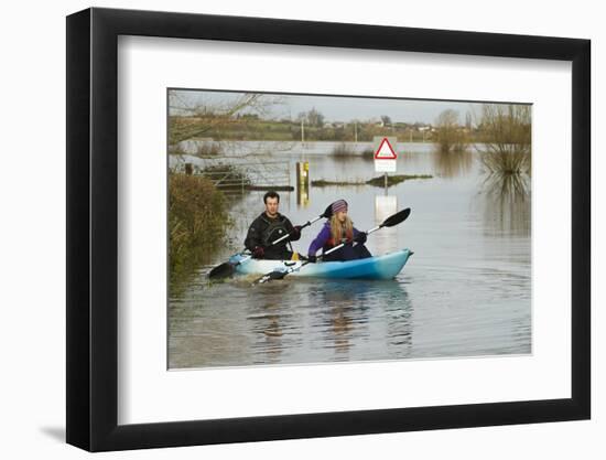 Couple in Kayak During January 2014 Flooding-David Woodfall-Framed Photographic Print