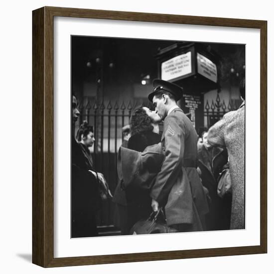 Couple in Penn Station Sharing Farewell Kiss Before He Ships Off to War During WWII-Alfred Eisenstaedt-Framed Photographic Print
