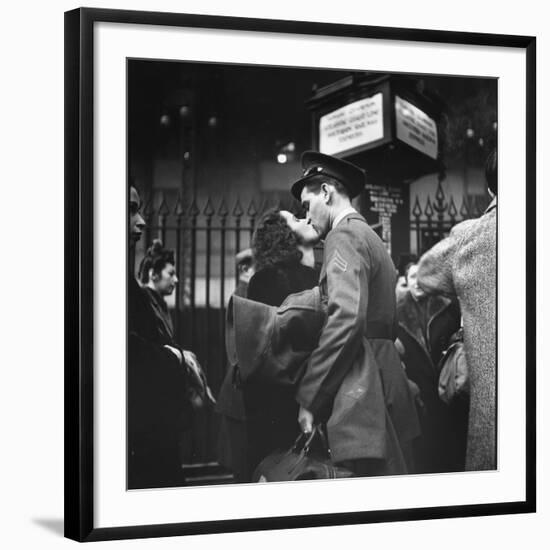 Couple in Penn Station Sharing Farewell Kiss Before He Ships Off to War During WWII-Alfred Eisenstaedt-Framed Photographic Print