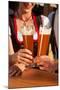 Couple in Traditional Bavarian Tracht - Dirndl and Lederhosen - in a Beer Tent at the Oktoberfest O-Kzenon-Mounted Photographic Print