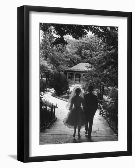 Couple Just Married Taking a Walk in a Park-Loomis Dean-Framed Photographic Print