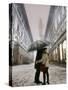 Couple Kiss Each Other During a Snowfall in Florence, Italy-null-Stretched Canvas