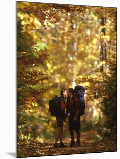Couple Kissing on the Trail During a Hike-null-Mounted Photographic Print