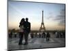 Couple Look Towards the Eiffel Tower, Paris, France, Europe-Andrew Mcconnell-Mounted Photographic Print