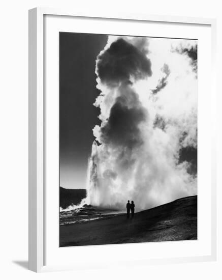Couple Looking at Geyser Old Faithful at Yellowstone National Park-Alfred Eisenstaedt-Framed Photographic Print