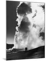 Couple Looking at Geyser Old Faithful at Yellowstone National Park-Alfred Eisenstaedt-Mounted Photographic Print