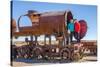 Couple of Tourists Visiting Cementerio De Trenes (Train Cemetery), Salar De Uyuni, Bolivia-Elzbieta Sekowska-Stretched Canvas