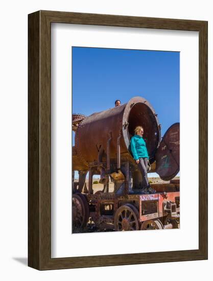 Couple of Tourists Visiting Cementerio De Trenes (Train Cemetery), Salar De Uyuni, Bolivia-Elzbieta Sekowska-Framed Photographic Print