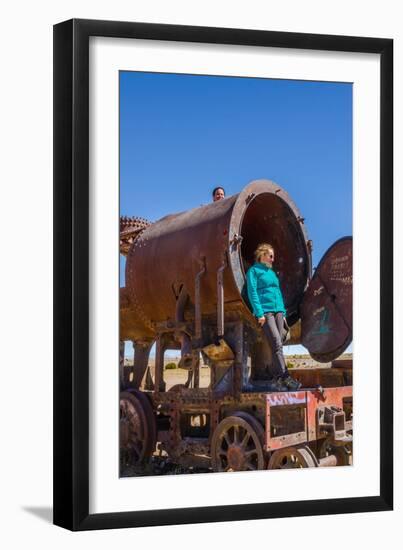 Couple of Tourists Visiting Cementerio De Trenes (Train Cemetery), Salar De Uyuni, Bolivia-Elzbieta Sekowska-Framed Photographic Print