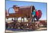 Couple of Tourists Visiting Cementerio De Trenes (Train Cemetery), Salar De Uyuni, Bolivia-Elzbieta Sekowska-Mounted Photographic Print