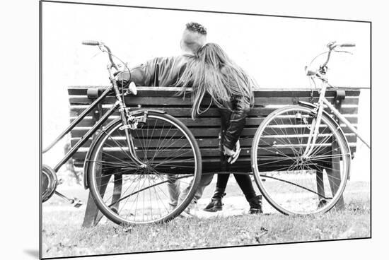 Couple on a Bench - Two Lovers Sitting on a Bench in a Park and Holding Themselves by Hands - Conce-Oneinchpunch-Mounted Photographic Print