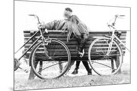 Couple on a Bench - Two Lovers Sitting on a Bench in a Park and Holding Themselves by Hands - Conce-Oneinchpunch-Mounted Photographic Print