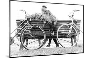 Couple on a Bench - Two Lovers Sitting on a Bench in a Park and Holding Themselves by Hands - Conce-Oneinchpunch-Mounted Photographic Print