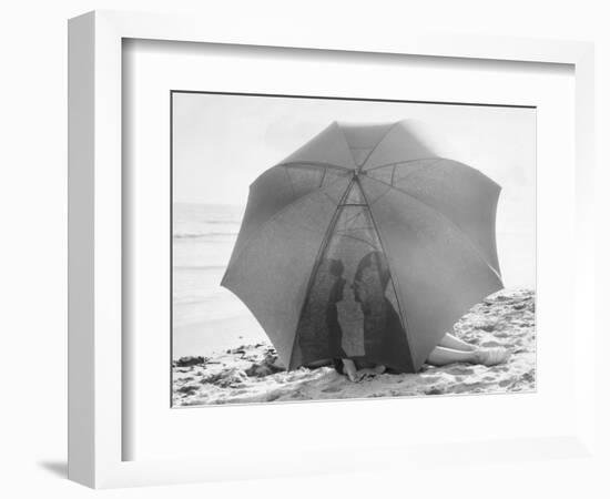 Couple on Beach under Umbrella-null-Framed Photographic Print