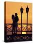 Couple on Bridge, Aruba, West Indies, Dutch Caribbean, Central America-Sergio Pitamitz-Stretched Canvas