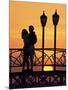 Couple on Bridge, Aruba, West Indies, Dutch Caribbean, Central America-Sergio Pitamitz-Mounted Photographic Print