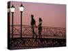 Couple on Bridge, Oranjestad, Aruba-Sergio Pitamitz-Stretched Canvas