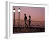 Couple on Bridge, Oranjestad, Aruba-Sergio Pitamitz-Framed Photographic Print