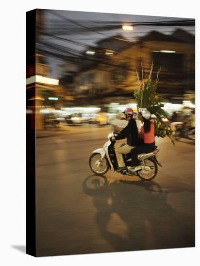 Couple on Moped Carrying Floral Display, Hanoi, Vietnam, Indochina, Southeast Asia, Asia-Purcell-Holmes-Stretched Canvas