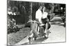 Couple on Motor Scooter-null-Mounted Art Print