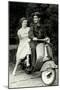 Couple on Motor Scooter-null-Mounted Art Print