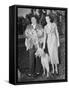 Couple Outside with Dog and Puppies-null-Framed Stretched Canvas