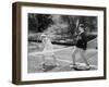 Couple Playing Tennis Together-null-Framed Photo