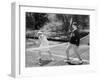 Couple Playing Tennis Together-null-Framed Photo