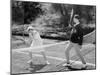 Couple Playing Tennis Together-null-Mounted Photo