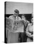 Couple Reading Newspaper Account of the Death of Evita Peron at 33 from Cancer-Alfred Eisenstaedt-Stretched Canvas