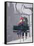 Couple Riding Up the Ski Lift During a Snow Storm, Vail, Colorado, USA-Paul Sutton-Framed Stretched Canvas