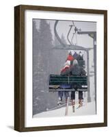Couple Riding Up the Ski Lift During a Snow Storm, Vail, Colorado, USA-Paul Sutton-Framed Photographic Print