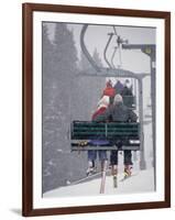 Couple Riding Up the Ski Lift During a Snow Storm, Vail, Colorado, USA-Paul Sutton-Framed Photographic Print