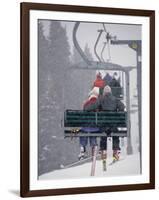 Couple Riding Up the Ski Lift During a Snow Storm, Vail, Colorado, USA-Paul Sutton-Framed Photographic Print