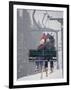 Couple Riding Up the Ski Lift During a Snow Storm, Vail, Colorado, USA-Paul Sutton-Framed Photographic Print