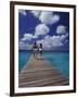 Couple Running on Dock, Curacao, Caribbean-Greg Johnston-Framed Photographic Print