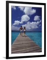 Couple Running on Dock, Curacao, Caribbean-Greg Johnston-Framed Photographic Print